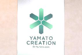 Yamato Creation signage and logo